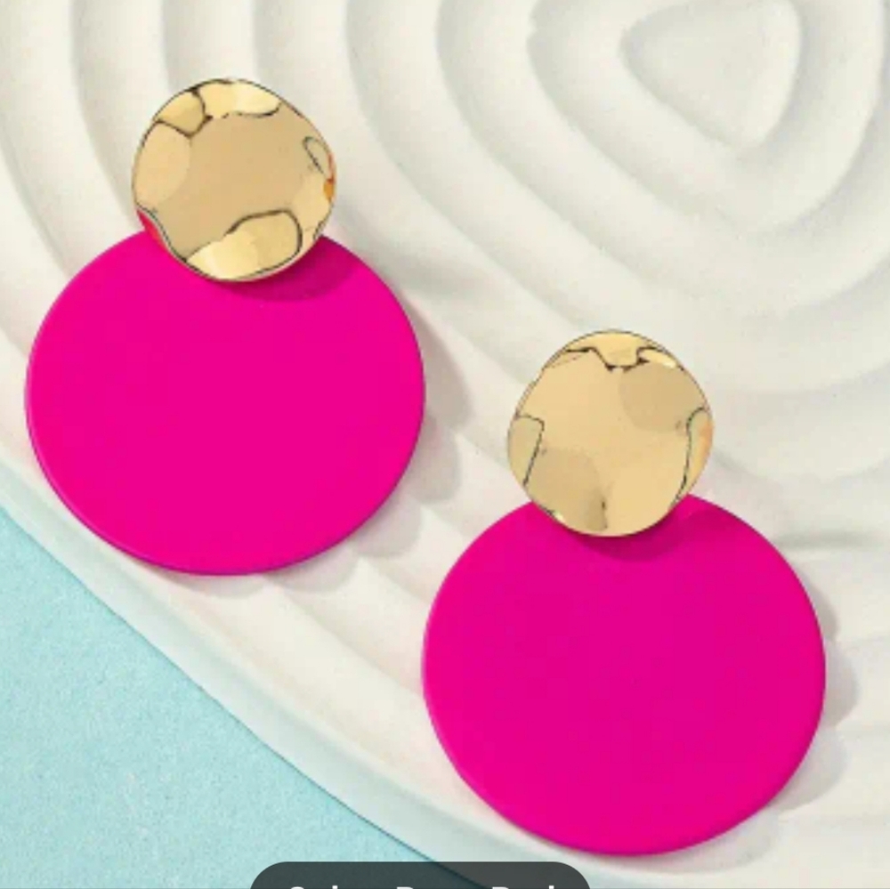 Hot pink round shaped earrings